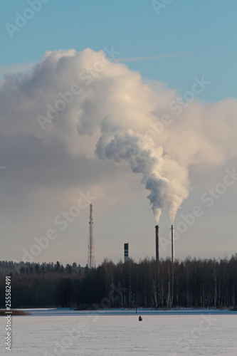 Factories steaming and smoking on a cold winter day