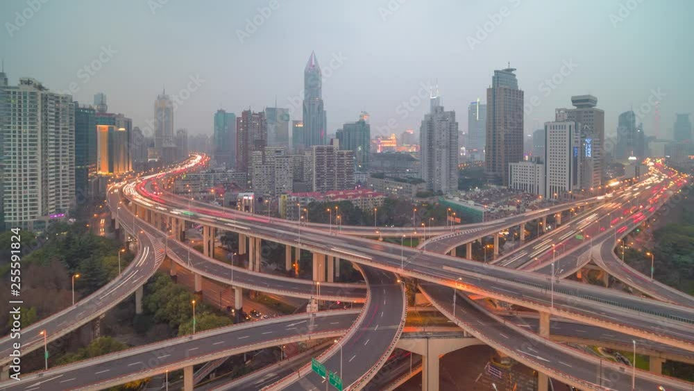Busy intersection city traffic in Shanghai, a timelapse clip Busy intersection city traffic in Shanghai, a timelapse clip