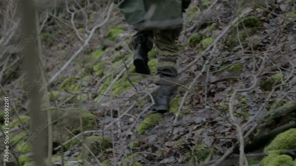 A group of scout saboteurs perform the task. An armed soldier without identification chevrons belonging to the army, terrorist, saboteur. A group of scout saboteurs perform the task. An armed soldier without identification chevrons belonging to the army, terrorist, saboteur.