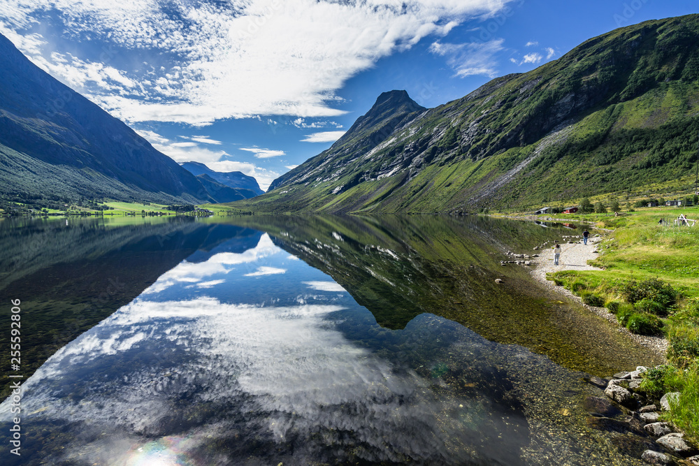 Fototapeta premium Scenic Eidsvatnet lake near Geirangerfjord with sky mirrored in the water, Sunnmore, More og Romsdal, Norway