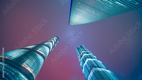 Wallpaper Mural Clouds moving close to three towers a look up timelapse clip at night in Shanghai Torontodigital.ca