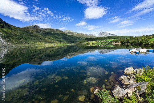 The amazing landscape of Eidsvatnet lake reflected in the water. Eidsvatnet lake is located between Geirangerfjord and Eidsdal  Sunnmore  More og Romsdal  Norway