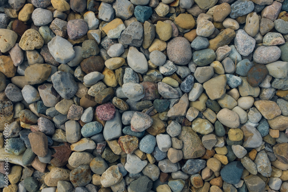 colorful pebbles on the beach colorful pebbles on the beach