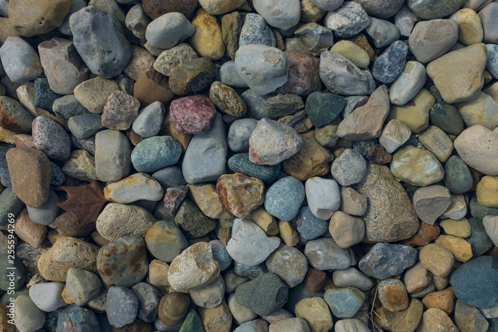 colorful pebbles on the beach colorful pebbles on the beach