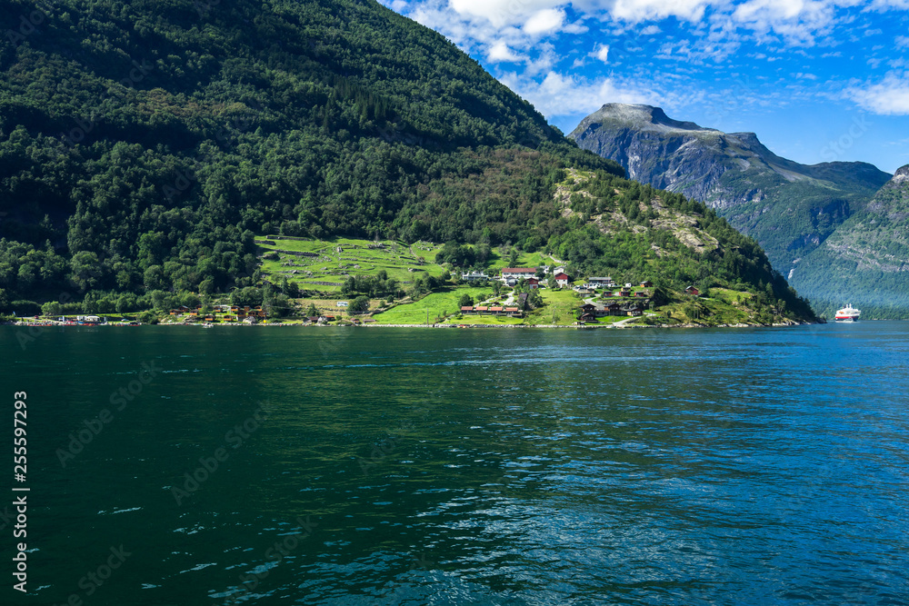 Amazing landscape of Geirangerfjord in a bright summer day viewed from a sightseeing boat, Sunnmore, More og Romsdal, Norway