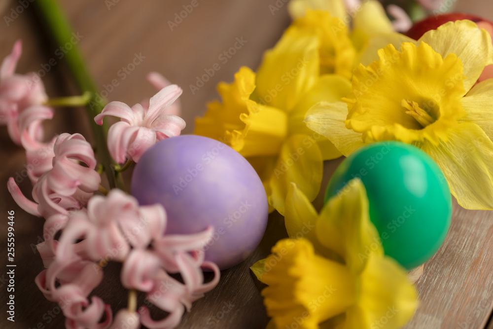 Top view of colorful easter eggs with flowers Top view of colorful easter eggs with flowers