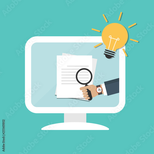 Businessman hands holding magnifying glass over document on computer. Idea concept with light bulb icon