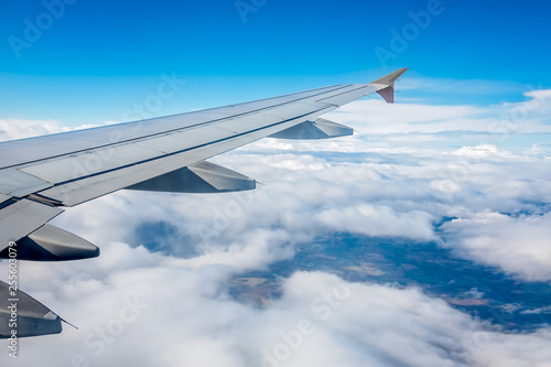 Window view of the wing of an airplane