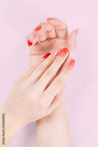 Perfect woman hands with colored nail polish isolated with clipping path