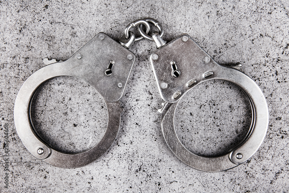 Handcuffs on the Metal Handcuffs on the Metal