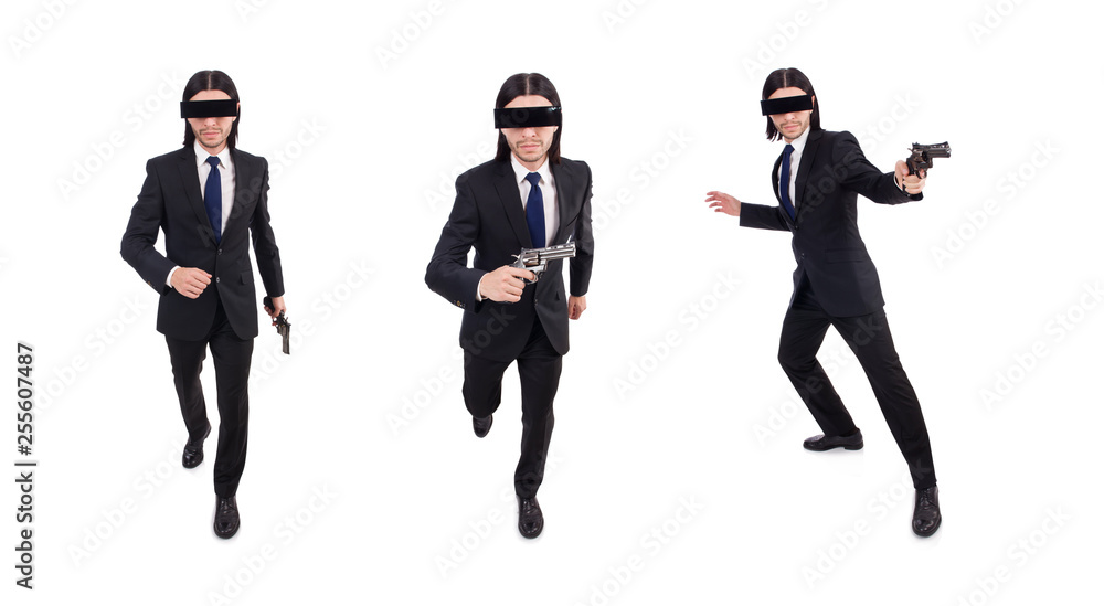 Young man with covered eyes and gun isolated on white Young man with covered eyes and gun isolated on white
