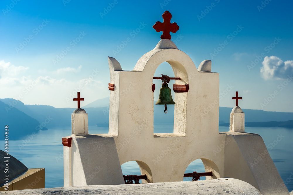 Bell tower of beautiful orthodox church at Santorini.