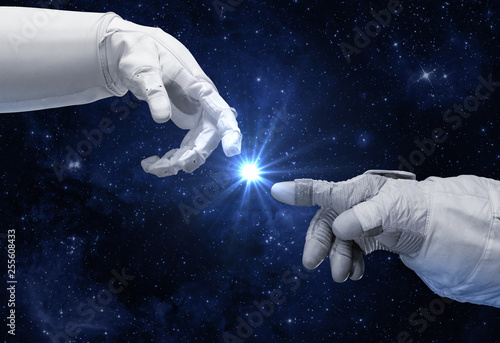 Fotografía Hand of astronaut and robot. Contact with other civilizations.