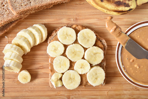 Making peanut butter banana sandwich
