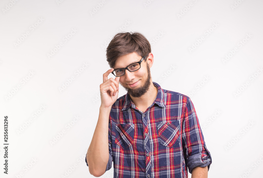 Expression and gesture concept - Surprised man looking at the camera on white background Expression and gesture concept - Surprised man looking at the camera on white background