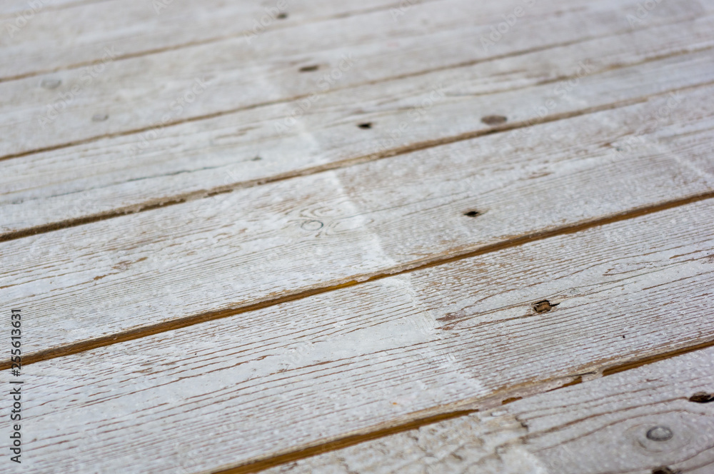 texture of the painted shabby wooden flooring made of boards, grunge background texture of the painted shabby wooden flooring made of boards, grunge background