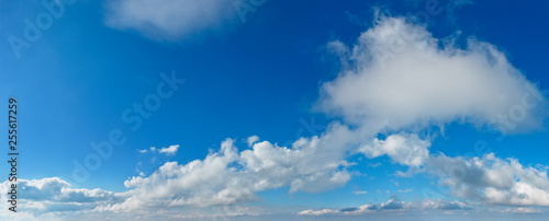 Blue sky background with clouds © wildman