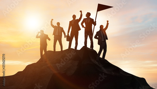 Obraz na plátně Businessmen in achievement and teamwork concept