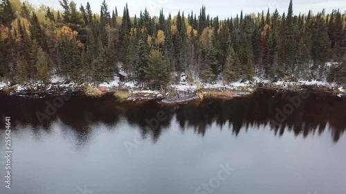 AERIAL: 4K drone aerial of canoeing, camping, and hiking in Whiteshell Provincial Park, Manitoba, Canada during the fall/autumn transition. Beautiful trees and leaves. photo