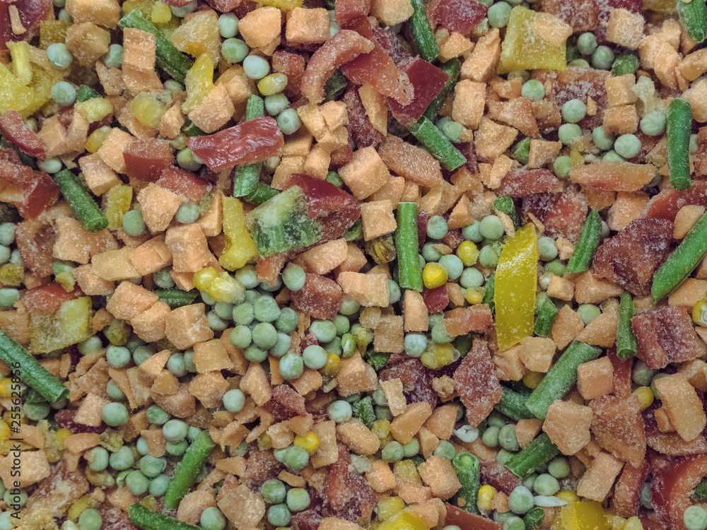 Frozen vegetable mix in a fridge in the store Frozen vegetable mix in a fridge in the store