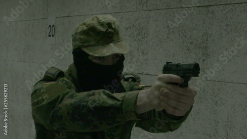 Soldier firing Walther P99 photo