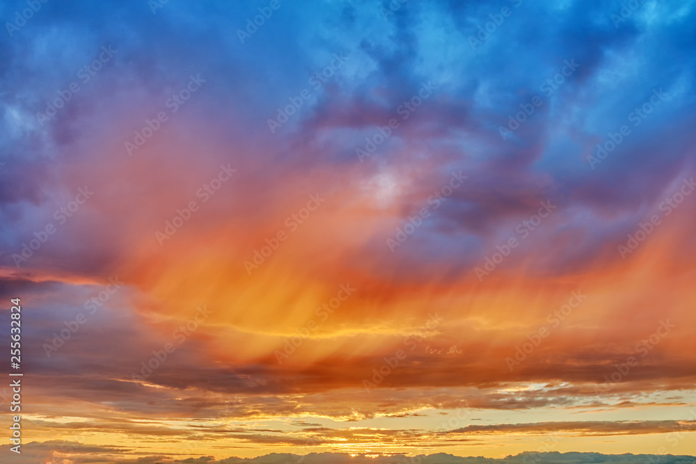 sunset sky background with natural color of beautiful cloud landscape and sun below horizon summer sunrise with sunlight transition from red to blue outdoor scene wide panorama view