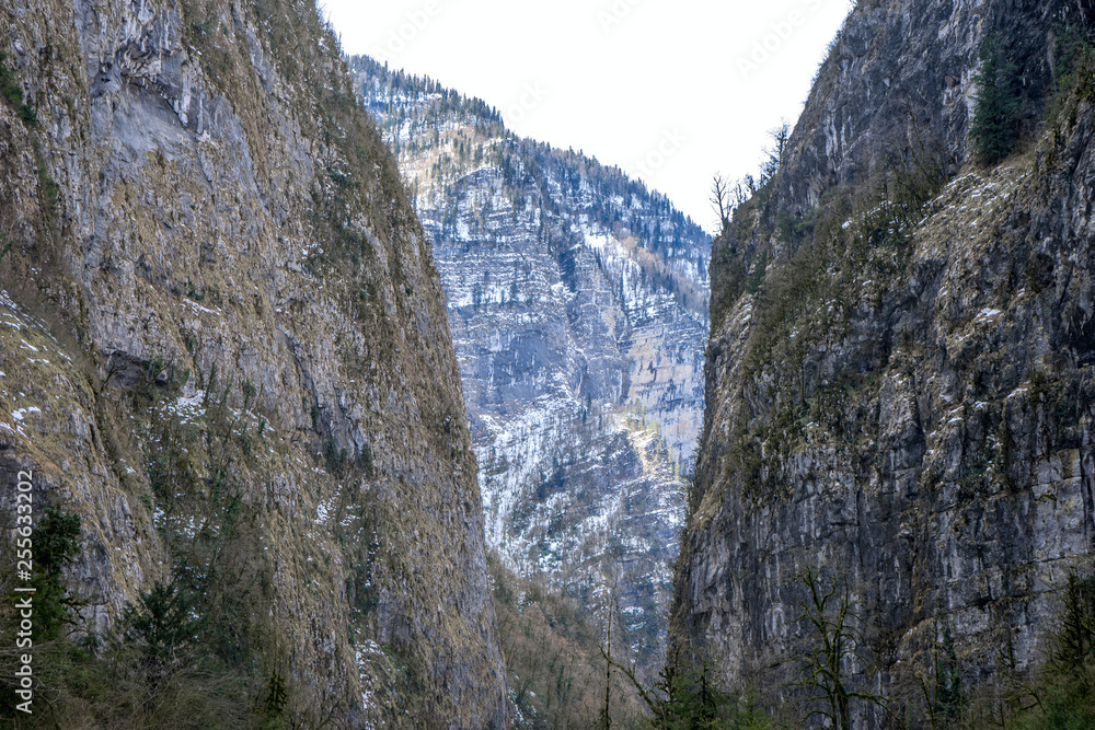 A narrow gorge in the mountains of Abkhazia. Steep cliffs at the edges of the road