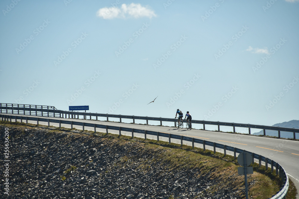 travel by bicycle on storseisundet bridge of norway