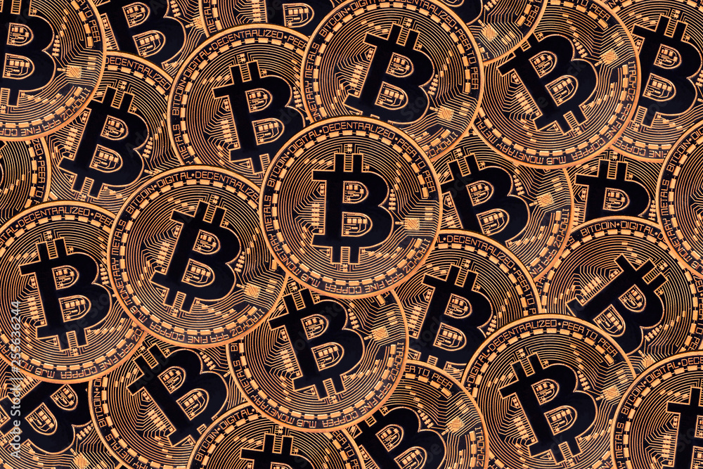Many bronze coins with Bitcoin sign, It is a cryptocurrency background.