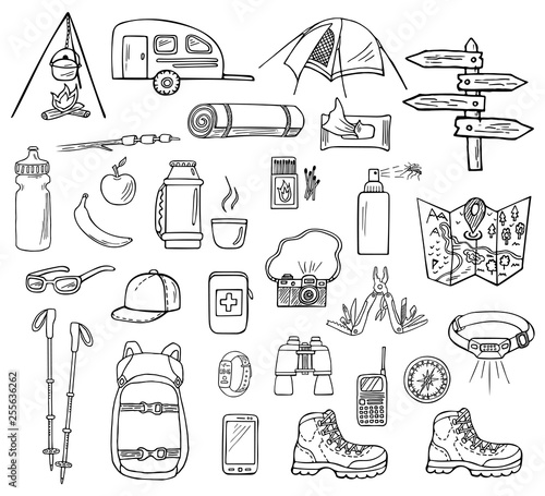 Set of hand-drawn camping icons isolated on white background. Doodle equipment, accessories, clothes, etc. for trekking and hiking. Black and white sketched vector illustration