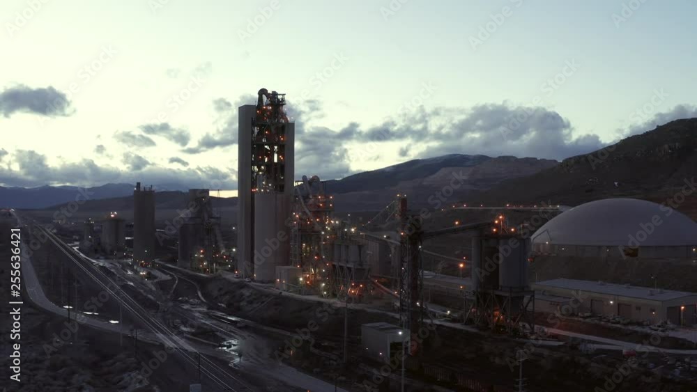 Aerial Flyby of Cement Factory Lit Up in Evening, Monolith, California Aerial Flyby of Cement Factory Lit Up in Evening, Monolith, California