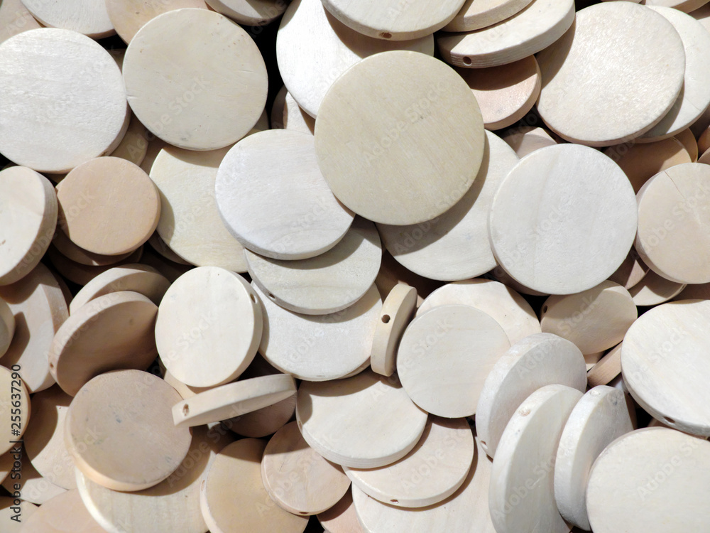 Many flat wooden rounds that can be used as texture or background.