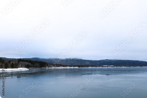 winter landscape with lake and snow © Lisa-Travis Walstad