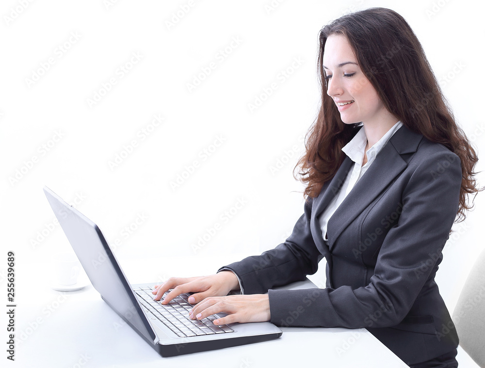 side view.business woman typing on a laptop. side view.business woman typing on a laptop.