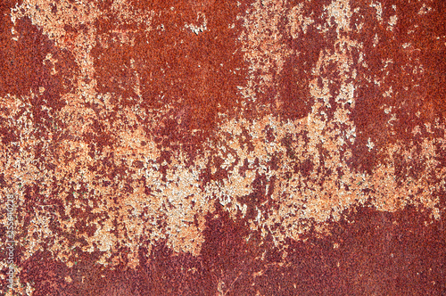 Rusty stain on the metal plate. Background texture of iron.