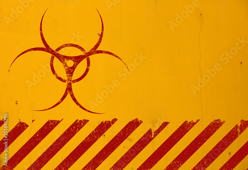 Foto Red biohazard sign over yellow background