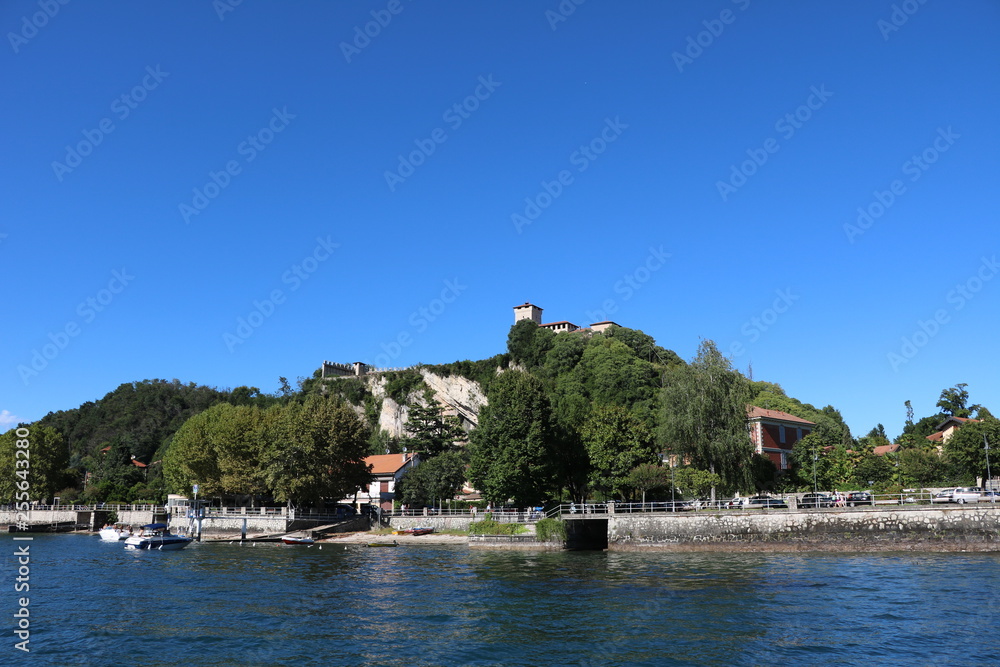 Naklejka premium View to Castle Rocca d'Angera in Angera at Lake Maggiore, Italy