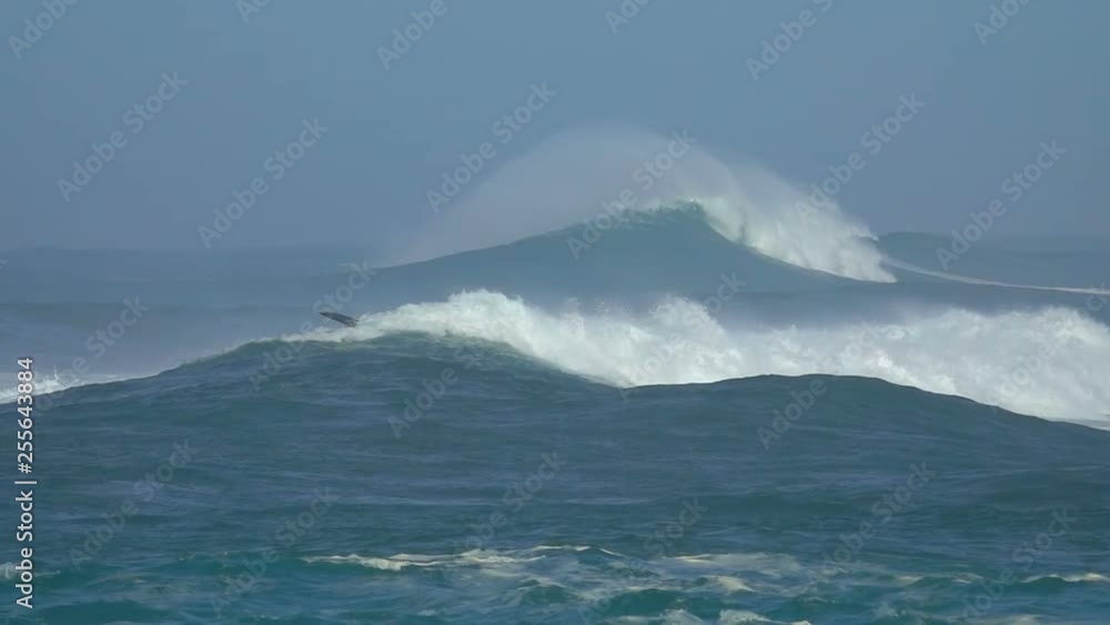 Sea Ocean Big waves Seaspray Surf Board in Water stormy sea blue sky Sea Ocean Big waves Seaspray Surf Board in Water stormy sea blue sky