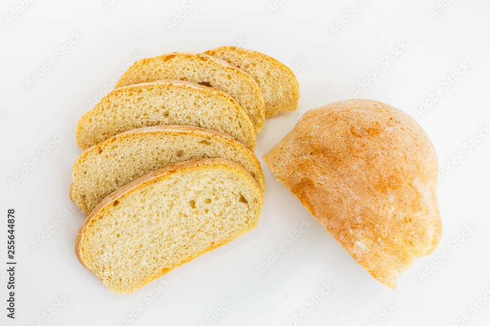 Fresh sliced ciabatta bread on a white background Fresh sliced ciabatta bread on a white background