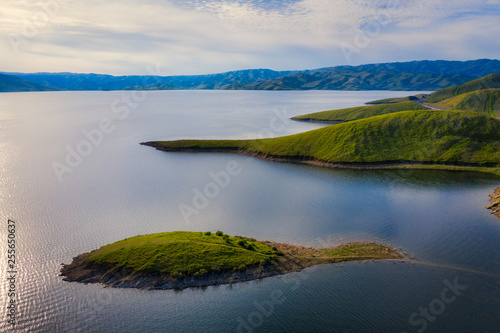 The San Luis Reservoir is an artificial lake on San Luis Creek in the eastern slopes of the Diablo Range of Merced County.. It is the fifth largest reservoir in California. Aerial photo. photo