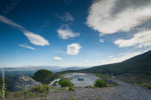 Rural Andalucia. Spain. 4x4 terrain vehicle in open space on a plateau summit. photo