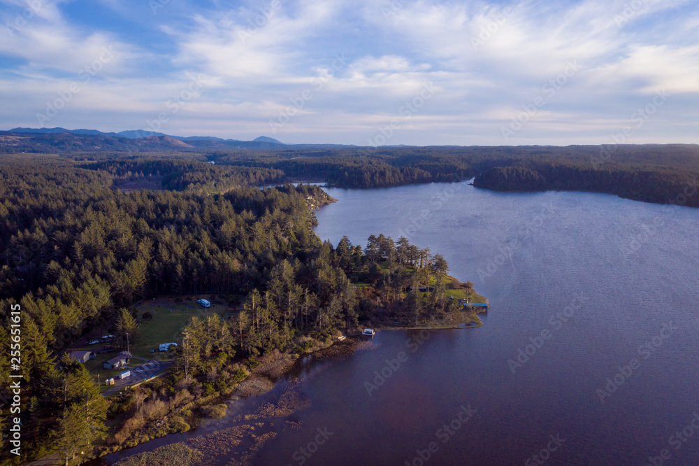   Aerial view of Floras Lake near Langlois, Southern Oregon. This lake is divided from the ocean by only a thin strip of land and is famous for its windsurfing during warmer months.
