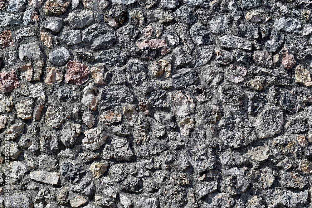 Fototapeta premium Stone wall closeup background