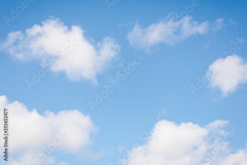 Beautiful white fluffy clouds on a blue sky background
