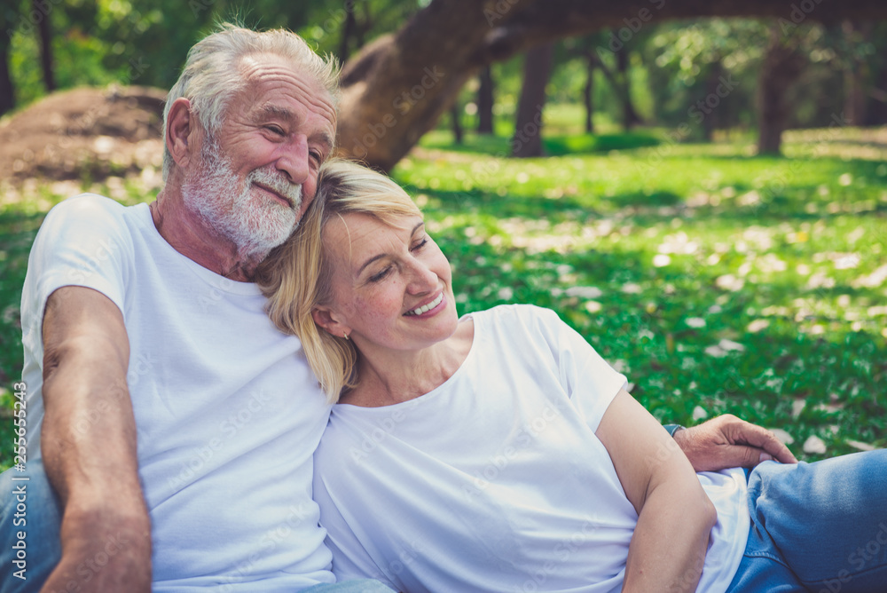 Senior couple in love enjoying togetherness outdoor.