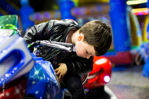  boy at the fair on a motorcycle