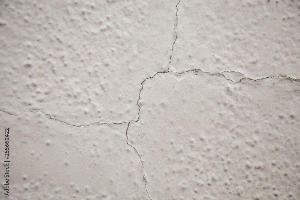 Obraz premium stucko wall with crack