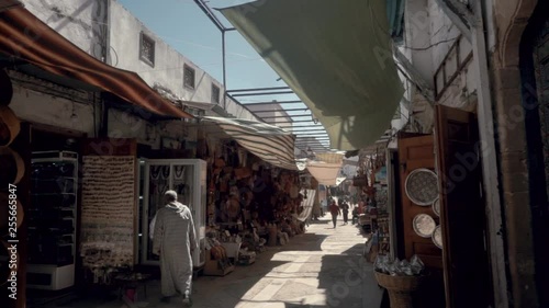 Slow motion of ancient marketplace in Marrakech Morocco.