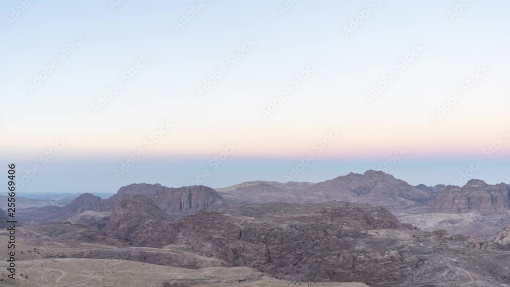 Night to day timelapse overlooking the mountains of Petra, Jordan Night to day timelapse overlooking the mountains of Petra, Jordan