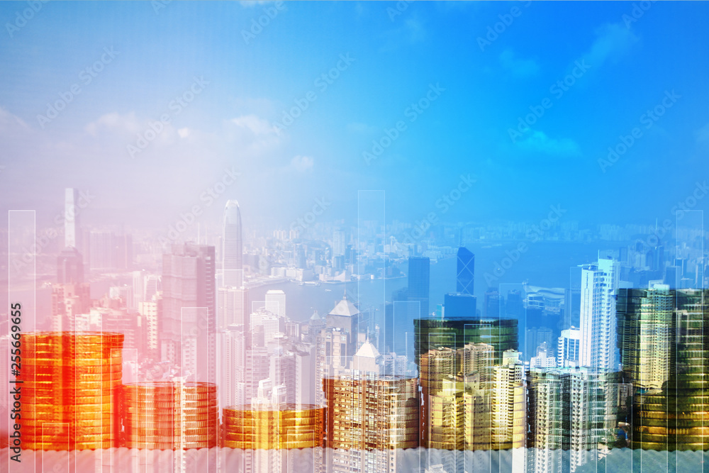 Double exposure of coin stack with financial graph over city and office building background, business and financial concept. Double exposure of coin stack with financial graph over city and office building background, business and financial concept.